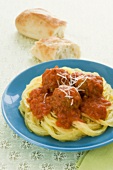 Meatballs and Tomato Sauce Served Over Spaghetti Squash, Bread