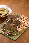 Surf and Turf; Grilled Angus Steaks with Shrimp on a Platter
