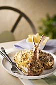 Two Lamb Chops on a Plate with Couscous