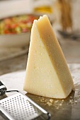 Wedge of Parmesan Cheese with Grater