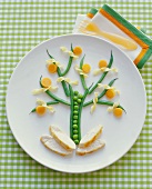 Childs Dinner of Chicken and Vegetables Forming a Tree