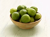 Key Limes in a Wooden Bowl