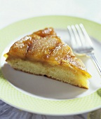 Slice of Tarte Tatin on a Plate with Fork