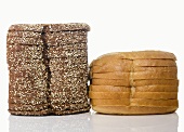 Stack of Whole Wheat Bread Next to a Stack of White Bread