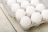 Organic White Eggs in a Cardboard Carton