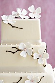 White Fondant Wedding Cake Decorated with Dogwood Branches