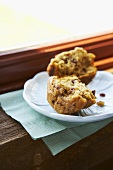 Cranberry Muffin Halved on a Blue Plate