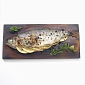 Trout Stuffed with Lemon, Pepper and Herbs; Cooked on Cedar Plank