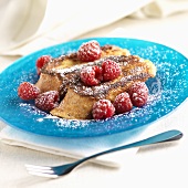 French Toast with Raspberries and Powdered Sugar