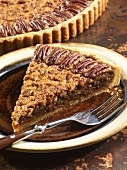 Slice of Pecan Tart on Plate with Fork