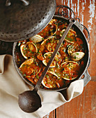 Clam and Pork Stew in Pot; Ladle