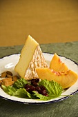 Cheese Wedge with Peach Slices and Almonds