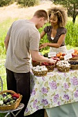 Man and Woman at Outdoor Organic Farmer's Market
