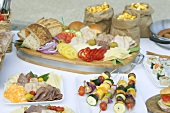 Party Spread with Sandwich Fixings, Kabobs and Snacks