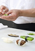 Chef Making Vegetarian Nigiri Sushi