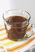 Homemade Barbecue Sauce in Glass Measuring Cup