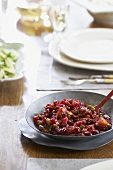 Chunky Cranberry Pistachio Sauce in Serving Bowl on Table
