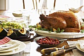 Whole Roasted Turkey on Thanksgiving Table