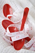 Measuring Tape with Plastic Red Spoons