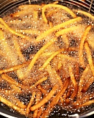 Fries Frying in Oil