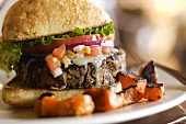Black Bean Burger with Melted Swiss and on a Bun; Roasted Sweet Potato