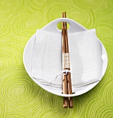 White Dish with Chopsticks and Napkin