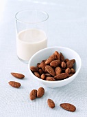Whole Almonds and a Glass of Almond Milk