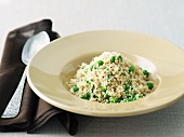 Couscous with Sweet Peas in a Bowl