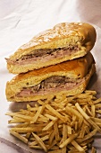Media Noche; Cuban Midnight Sandwich; Ham, Cheese and Roast Pork on Flattened Cuban Bread; Potato Sticks