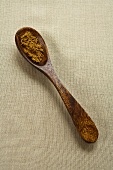 Cumin in Wooden Spoon