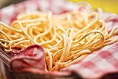 Dried Linguine Pasta in a Basket