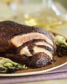 Smokey Barbecued Duck; Partially Sliced on a Platter