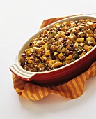 Baked Stuffing with Apple, Raisins and Butternut Squash in Baking Dish