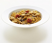 Bowl of Raisin Flake Cereal with Raspberries