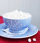 Blue Bowl on Matching Plate Filled with Mini Marshmallows