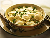 Bowl of Cheese Raviolis with Peas