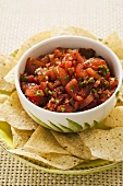 Thick and Chunky Salsa in a Bowl with Tortilla Chips