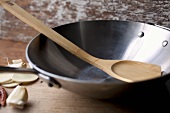 Wok and Wooden Spoon; Garlic