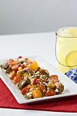 Heirloom Tomato and Feta Cheese Salad with Pesto Sauce; Lemonade