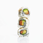Stacked Inside Out Ura-Maki Roll Sushi with Salmon and Avocado