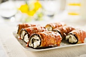 Aubergine rolls with tomato sauce