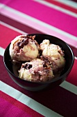 Bowl of Cherry Ripple Ice Cream; On Striped Cloth