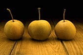 Three Asian Pears on a Wood Table