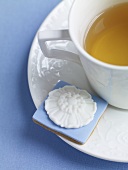 Cup of Tea with Pretty Blue and White Tea Cookie