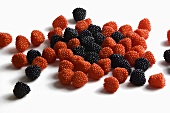 Black and Red Haribo Raspberries; Candy; White Background