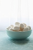 White eggs in a bowl