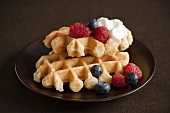 Waffles with Blueberries and Raspberries and Whipped Cream