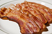 Plate of Cooked Bacon Strips