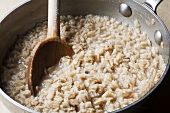 Pot of Oatmeal with Wooden Spoon