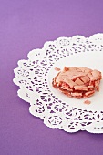 A Squished Macaroon on a Paper Doily